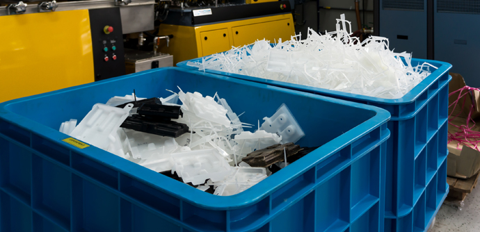 Scrap bins for plastics manufacturing